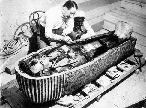 One of the historical photographs taken by Abdallah's father. Howard Carter unwrapping Tutankhamun's mummy