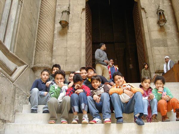 The kids in front of Al Sultan Hassan Mosque