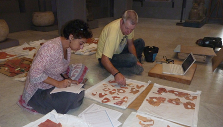 Salima Ikram and Andre Veldmeijer retrieve extraordinary leather fragments of an ancient chariot from abandoned casings at the Egyptian Museum in Cairo Photo: The American University in Cairo
